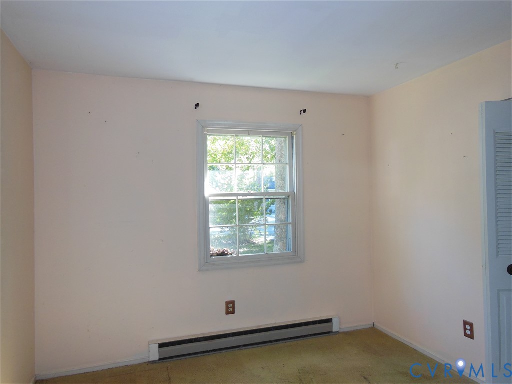10524 Sunne Court Chesterfield, VA 23832 - Photo 17 of 21 an empty room with a window