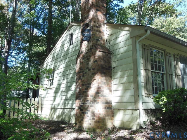 a backyard of a house with lots of green space