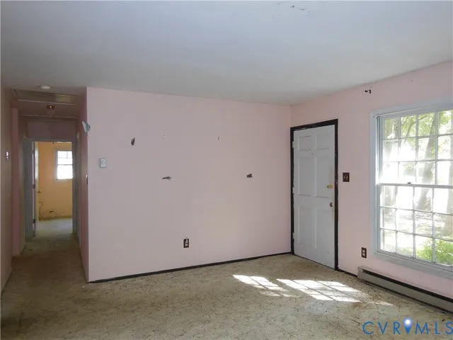 a living room with a fireplace