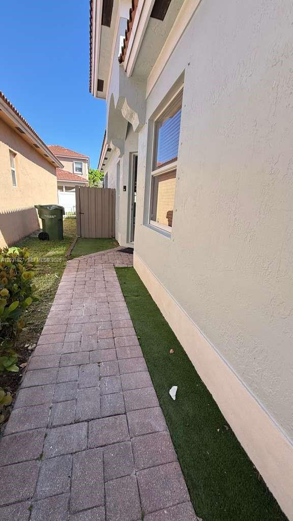 2120 Northeast 37th Road, Unit 1 Homestead, FL 33033 - Photo 11 of 30 a view of a backyard of the house