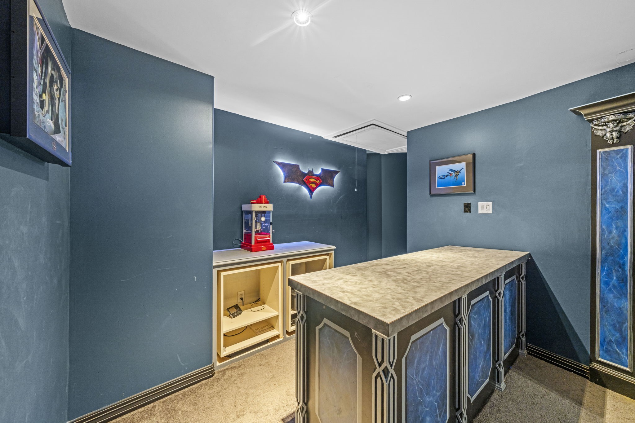 18732 Kz Road Cypress, TX 77433 - Photo 23 of 49 No need to miss a single scene, keep the snacks close by with a built-in bar right inside the media room.