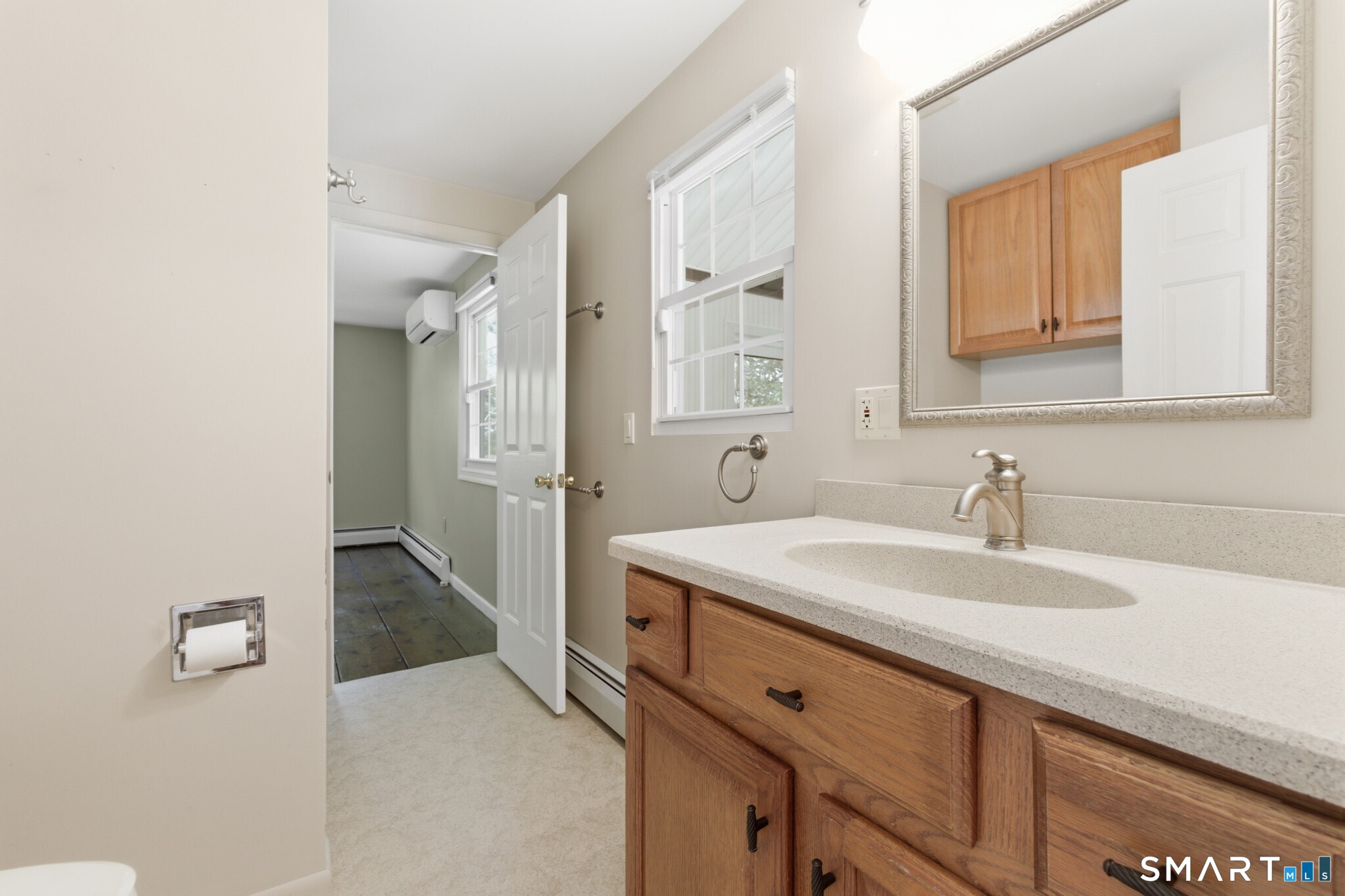70 Mahoney Road Colchester, CT 06415 - Photo 18 of 40 a bathroom with a sink and a mirror