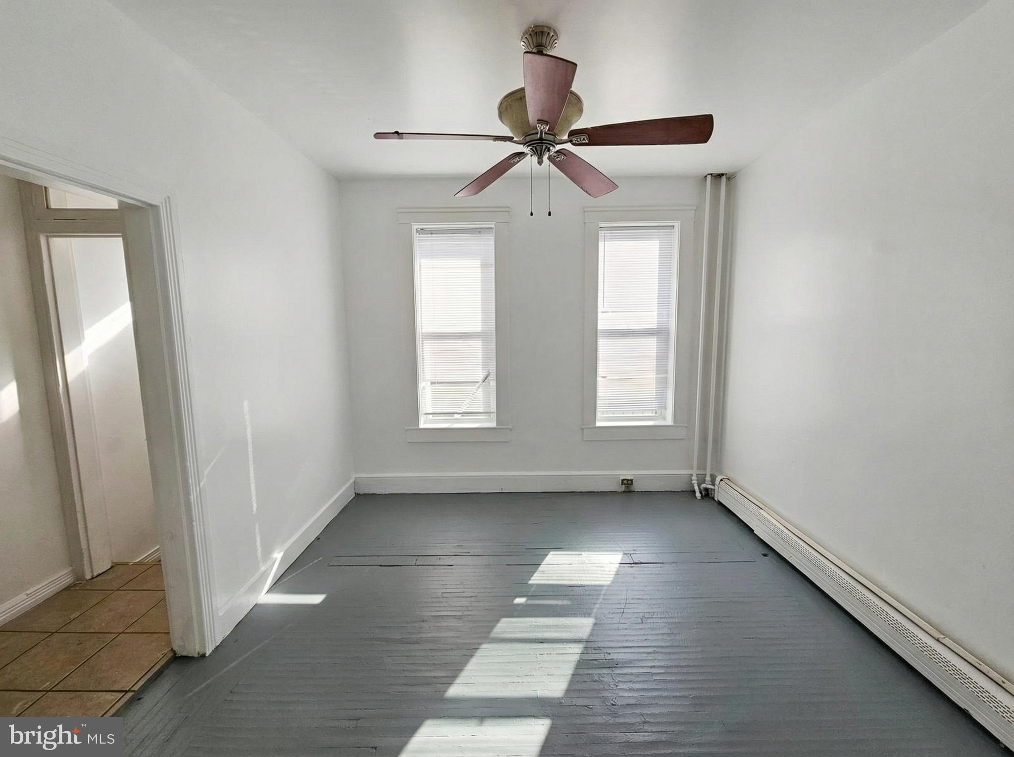 345 East Princess Street York, PA 17403 - Photo 2 of 14 a view of empty room with wooden floor and fan