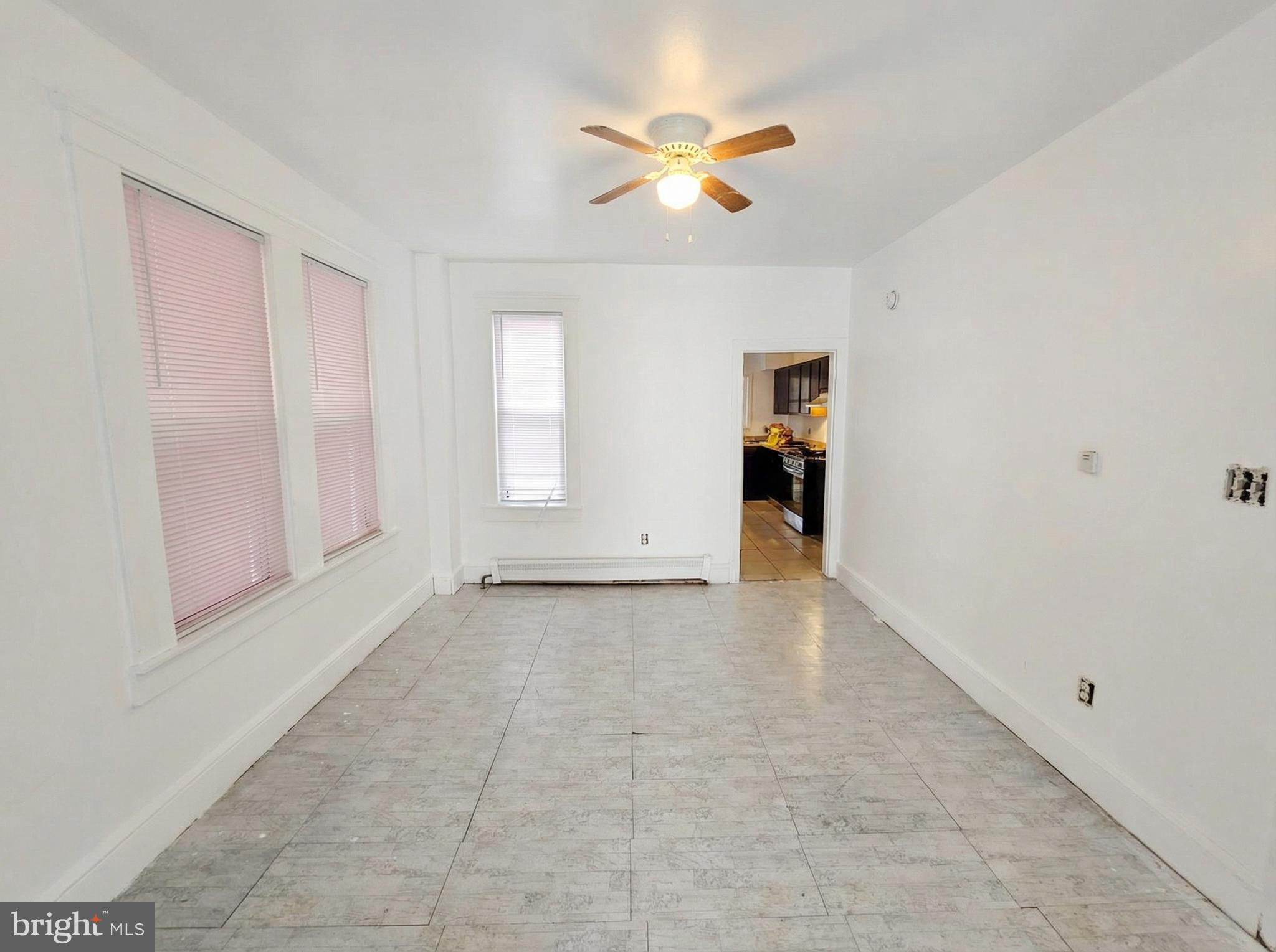 345 East Princess Street York, PA 17403 - Photo 3 of 14 wooden floor in an empty room with a window