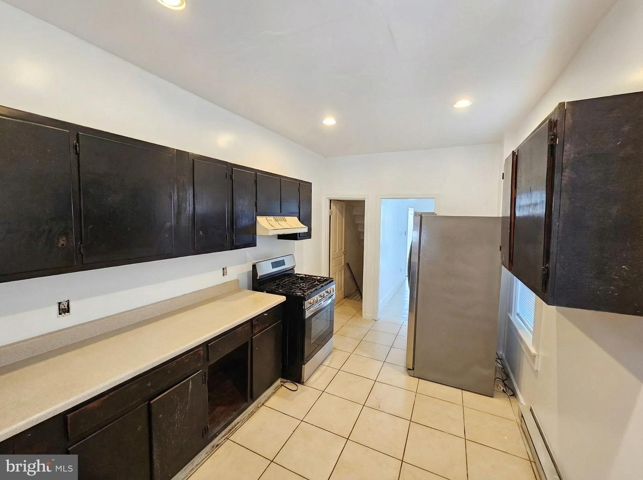 345 East Princess Street York, PA 17403 - Photo 4 of 14 a kitchen with stainless steel appliances a refrigerator sink and cabinets