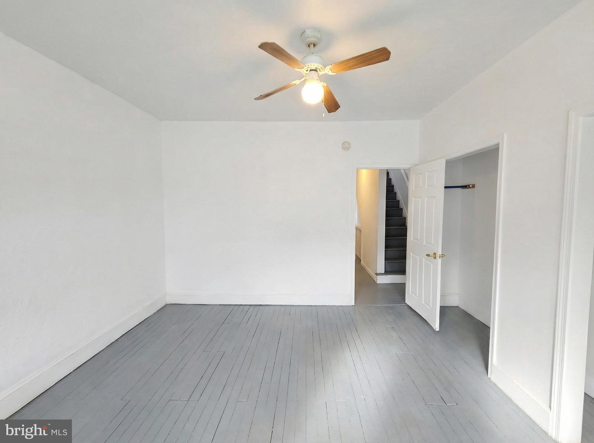 345 East Princess Street York, PA 17403 - Photo 10 of 14 an empty room with wooden floor and a ceiling fan
