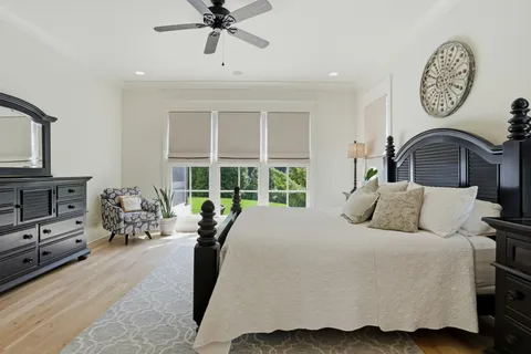 a spacious bathroom with a bathtub and sink