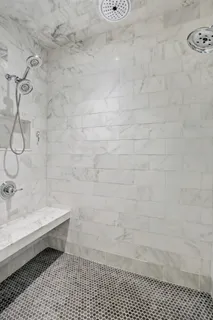 a bedroom with a bed and furniture