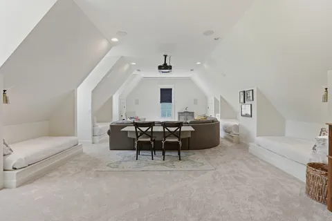 a front view of a house with garden and porch