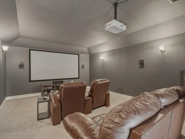a living room with furniture a walk in closet and a window