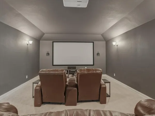 a bedroom with a bed and a desk