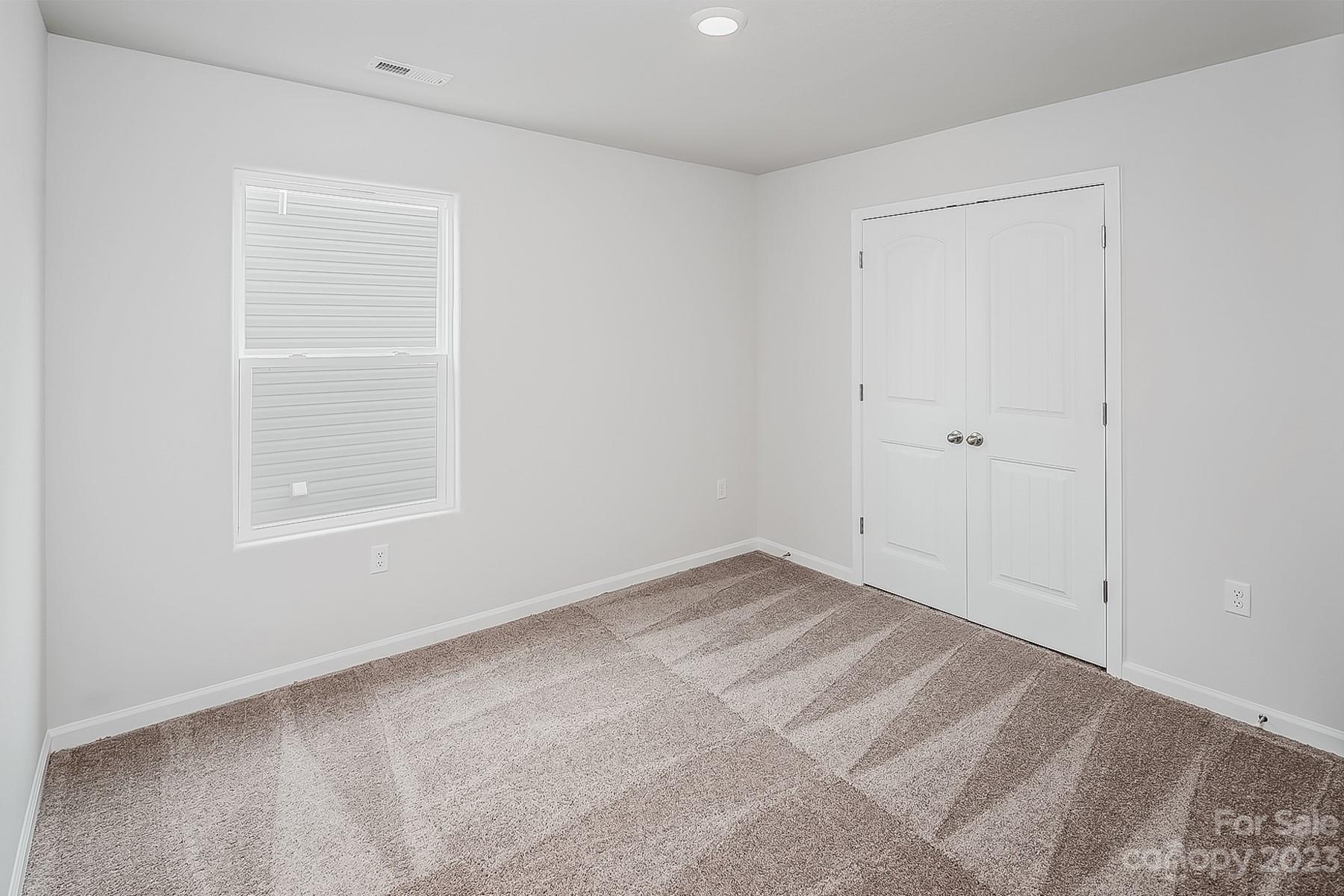 1556 Nia Road Charlotte, NC 28215 - Photo 15 of 15 a view of an empty room with a window