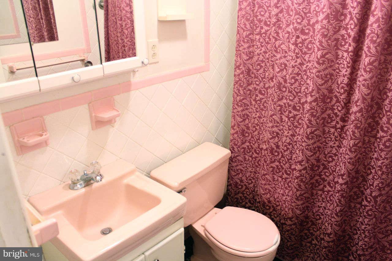 3055 Riverview Drive Riva, MD 21140 - Photo 20 of 30 a white toilet sitting next to a bathroom sink