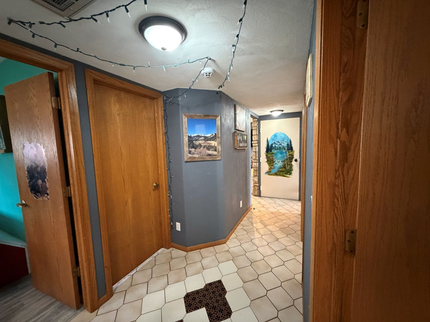 2276 Cross Street Freeport, IL 61032 - Photo 12 of 15 a view of a hallway with wooden floor and a living room