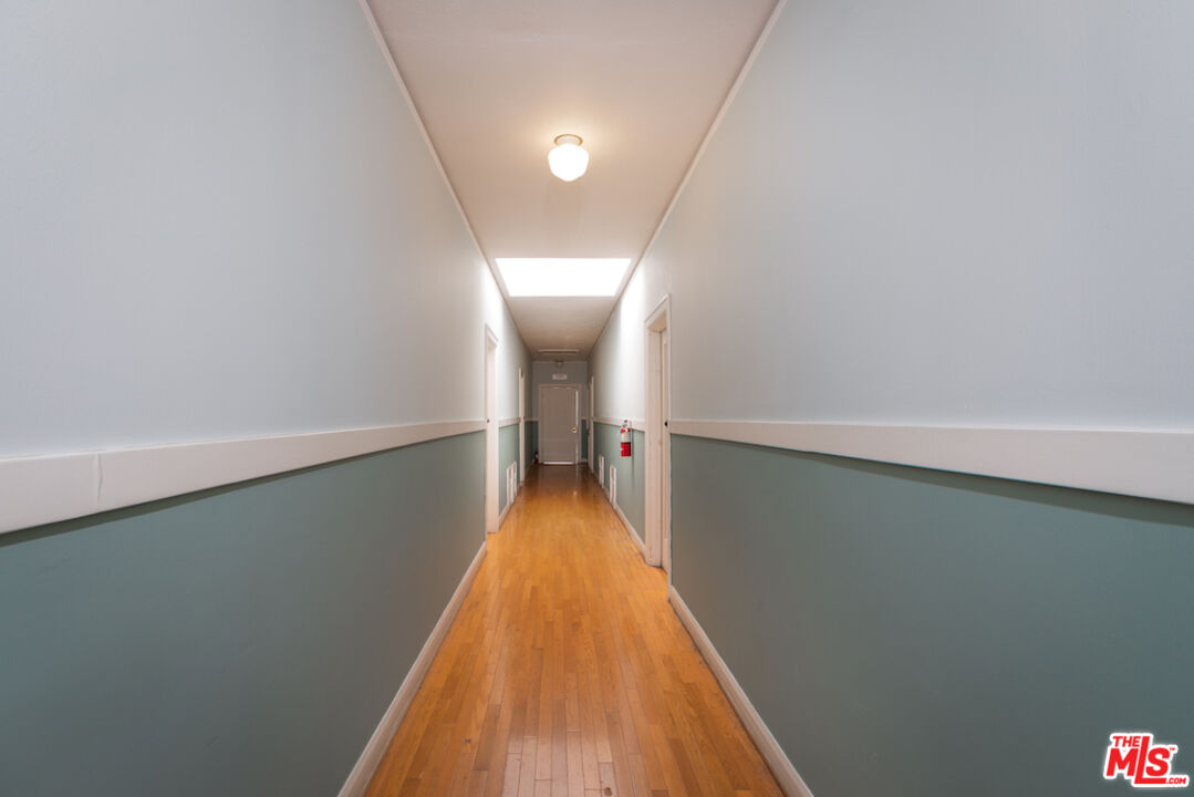 5121 1/2 Eagle Rock Boulevard, Unit E Los Angeles, CA 90065 - Photo 14 of 14 a view of a room with wooden floor