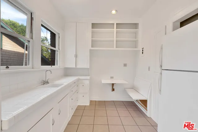 a bathroom with a sink a toilet and a bathtub