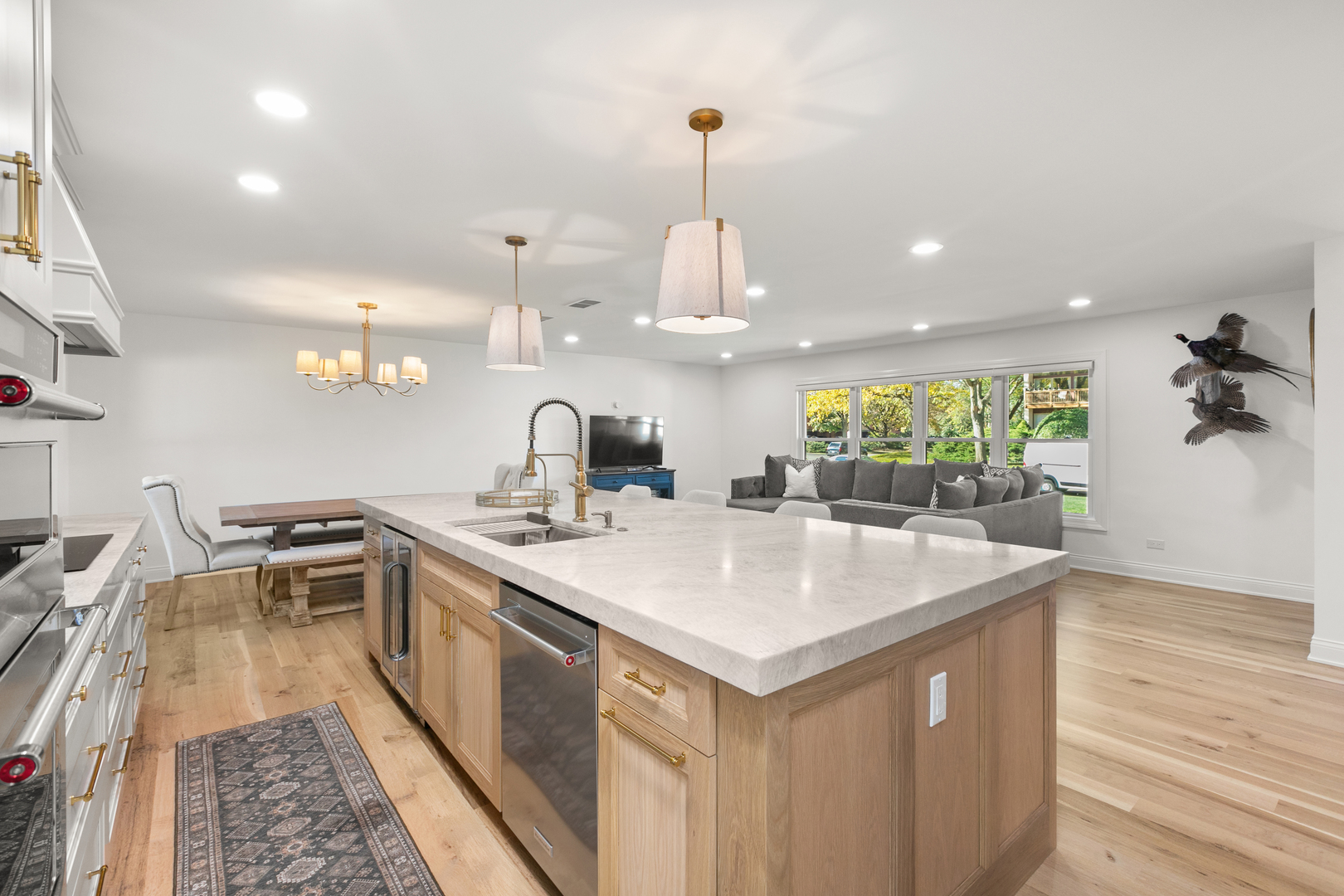 1349 Tinker Way Glenview, IL 60025 - Photo 11 of 42 a kitchen with a sink and wooden floor