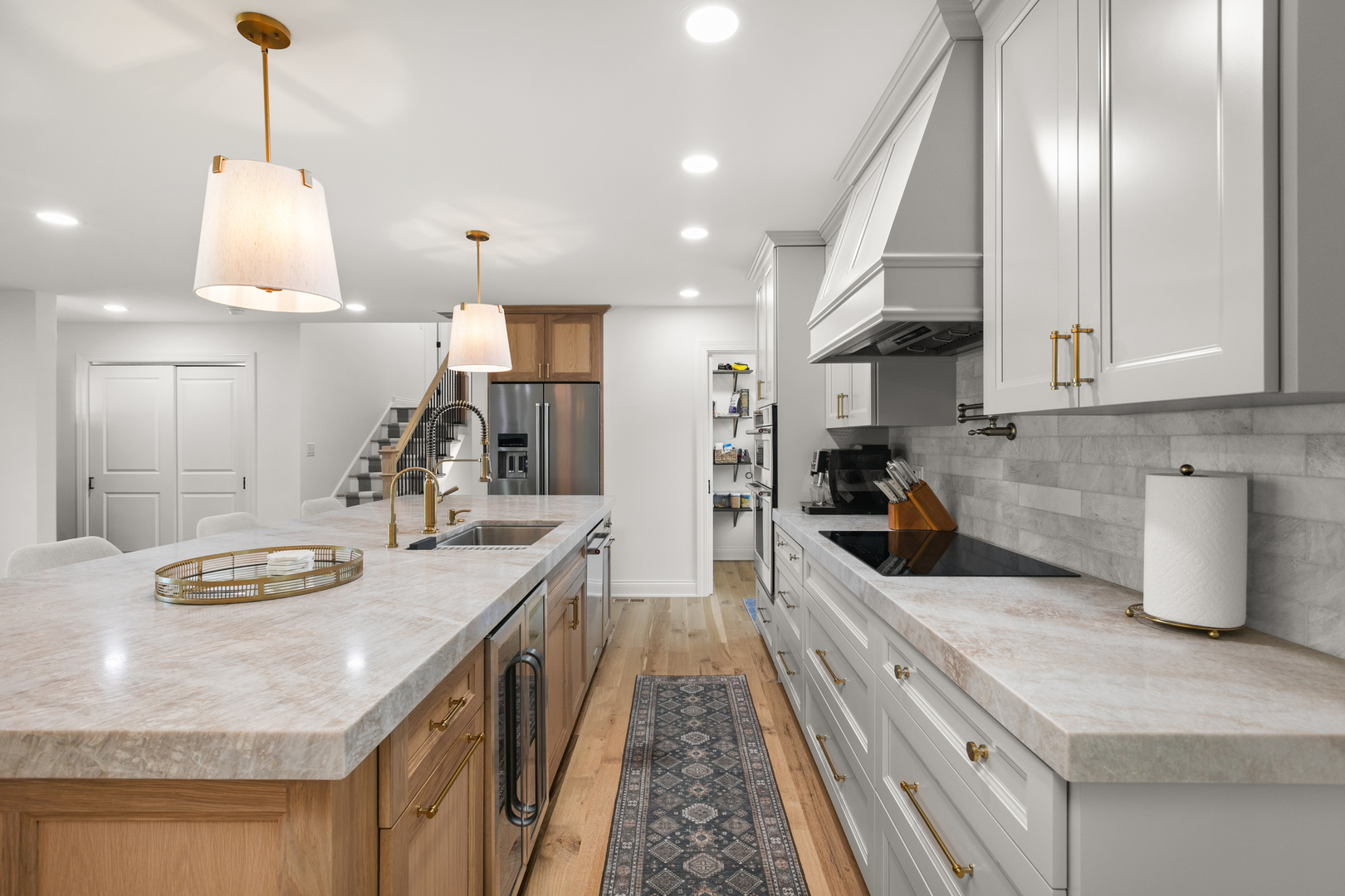 1349 Tinker Way Glenview, IL 60025 - Photo 12 of 42 a kitchen with stainless steel appliances granite countertop a sink a stove and a wooden floors