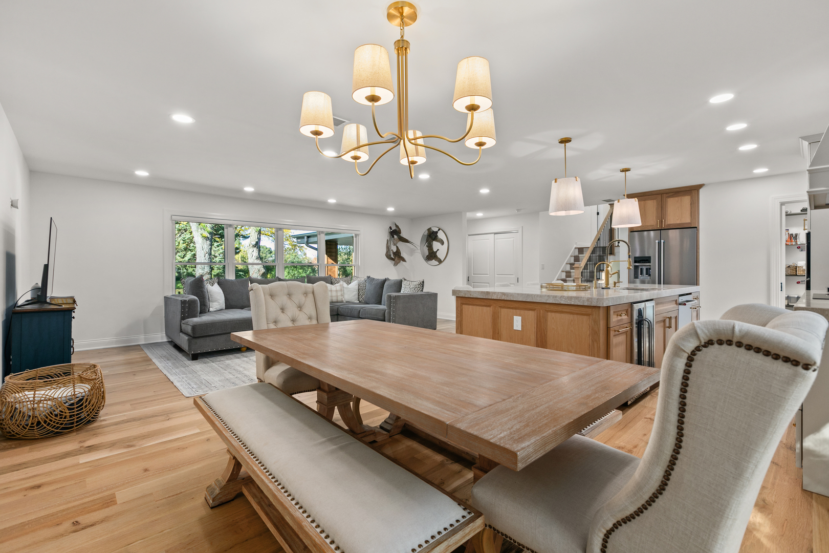 1349 Tinker Way Glenview, IL 60025 - Photo 14 of 42 a large kitchen with a table and chairs