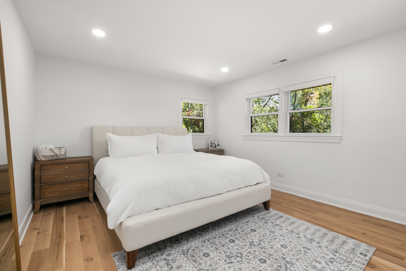 1349 Tinker Way Glenview, IL 60025 - Photo 18 of 42 a bedroom with a bed and a window