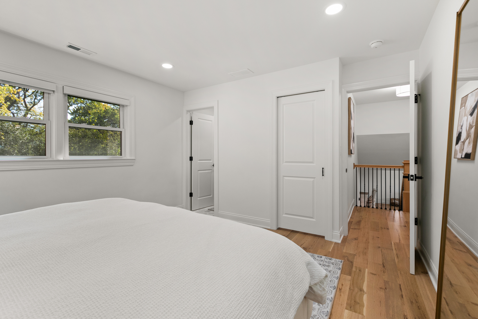 1349 Tinker Way Glenview, IL 60025 - Photo 19 of 42 a bedroom with a bed and a window