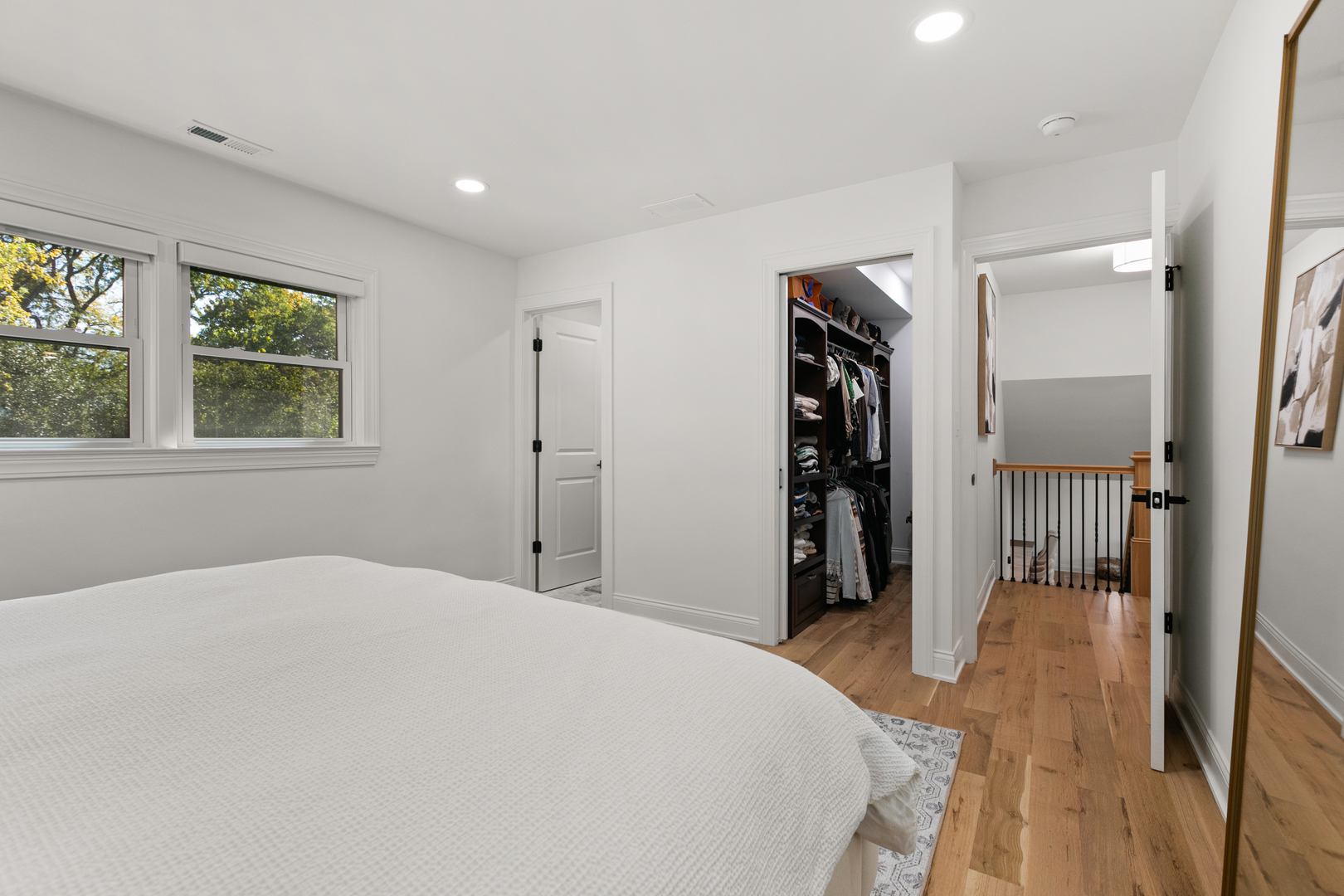 1349 Tinker Way Glenview, IL 60025 - Photo 20 of 42 a bedroom with a bed and a window