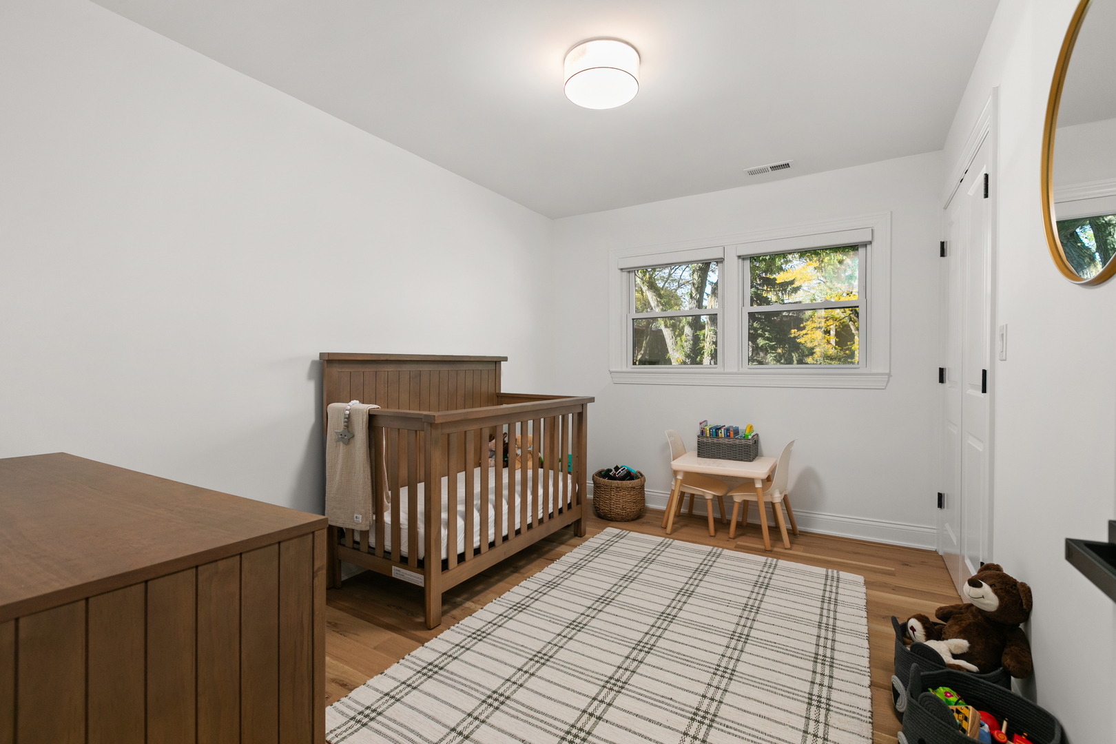 1349 Tinker Way Glenview, IL 60025 - Photo 22 of 42 a bedroom with furniture and a window