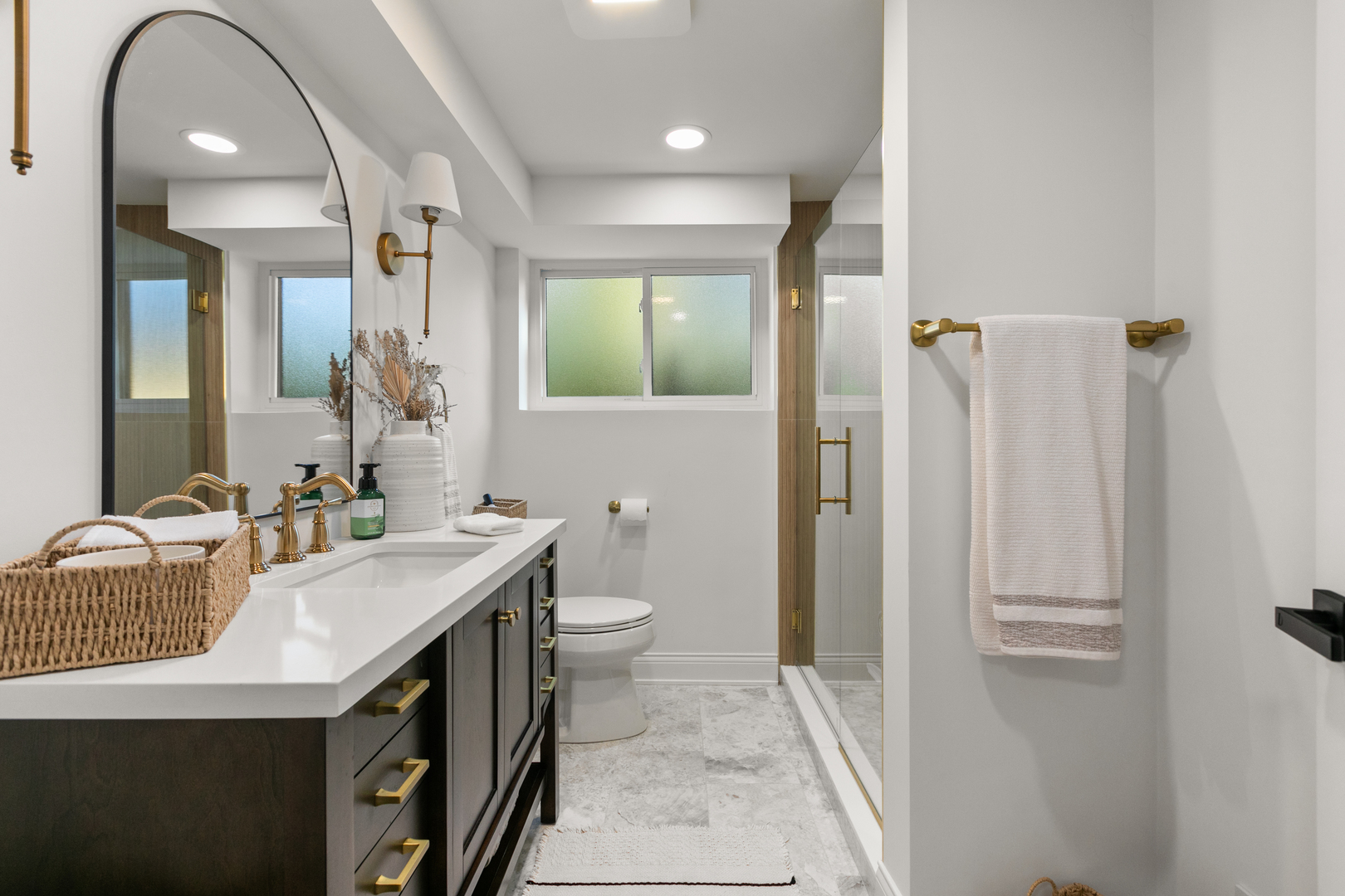 1349 Tinker Way Glenview, IL 60025 - Photo 25 of 42 a bathroom with a sink a toilet and shower