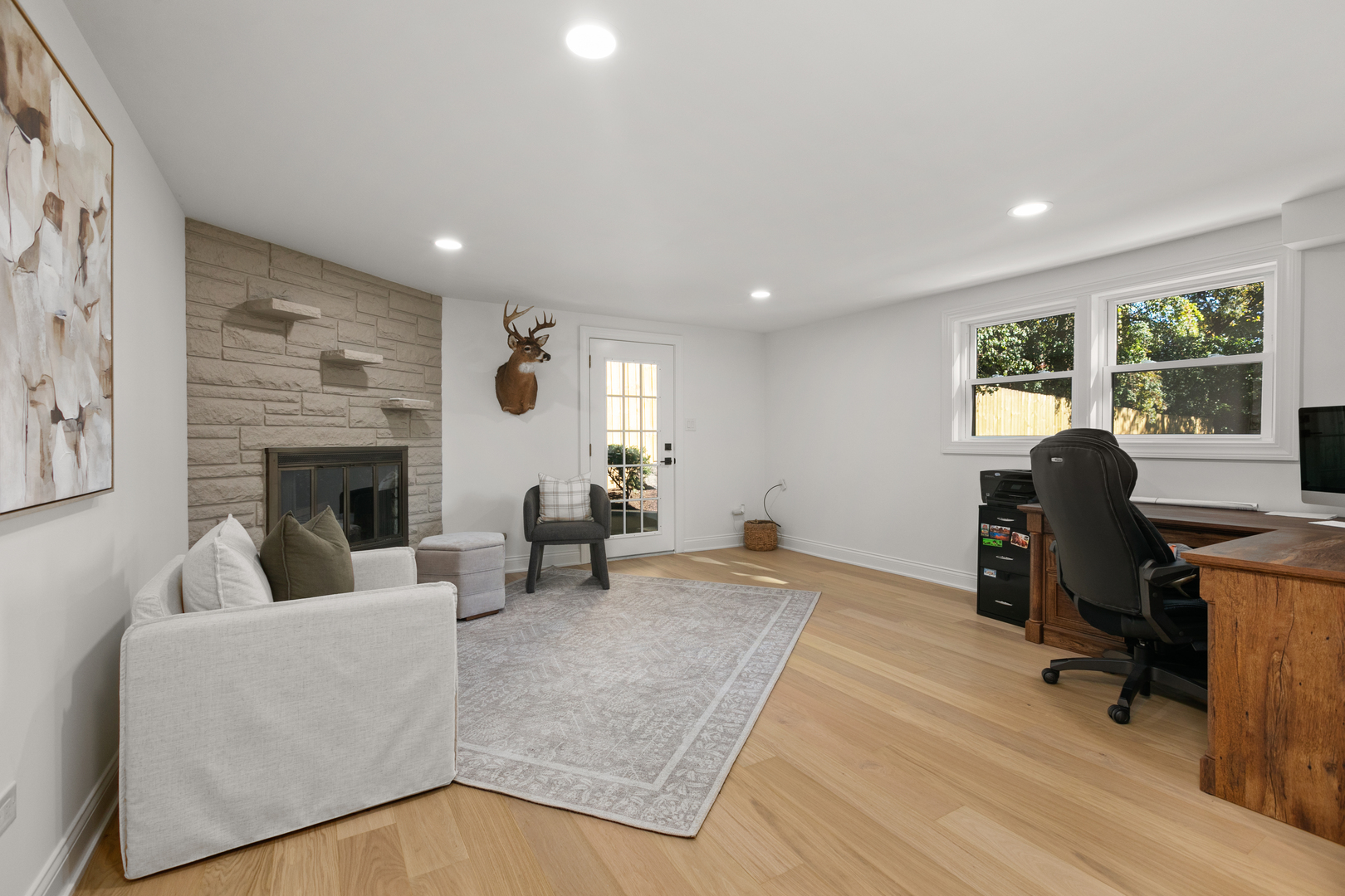 1349 Tinker Way Glenview, IL 60025 - Photo 28 of 42 a living room with furniture fireplace and window
