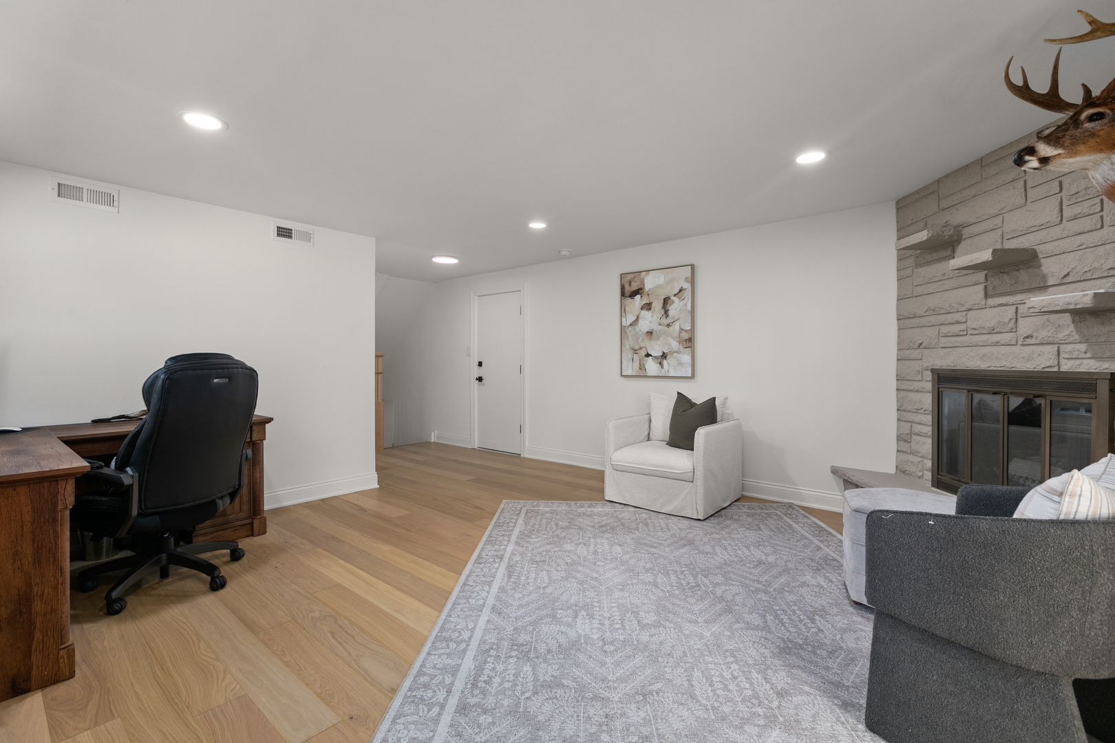 1349 Tinker Way Glenview, IL 60025 - Photo 29 of 42 a bedroom with furniture and a fireplace