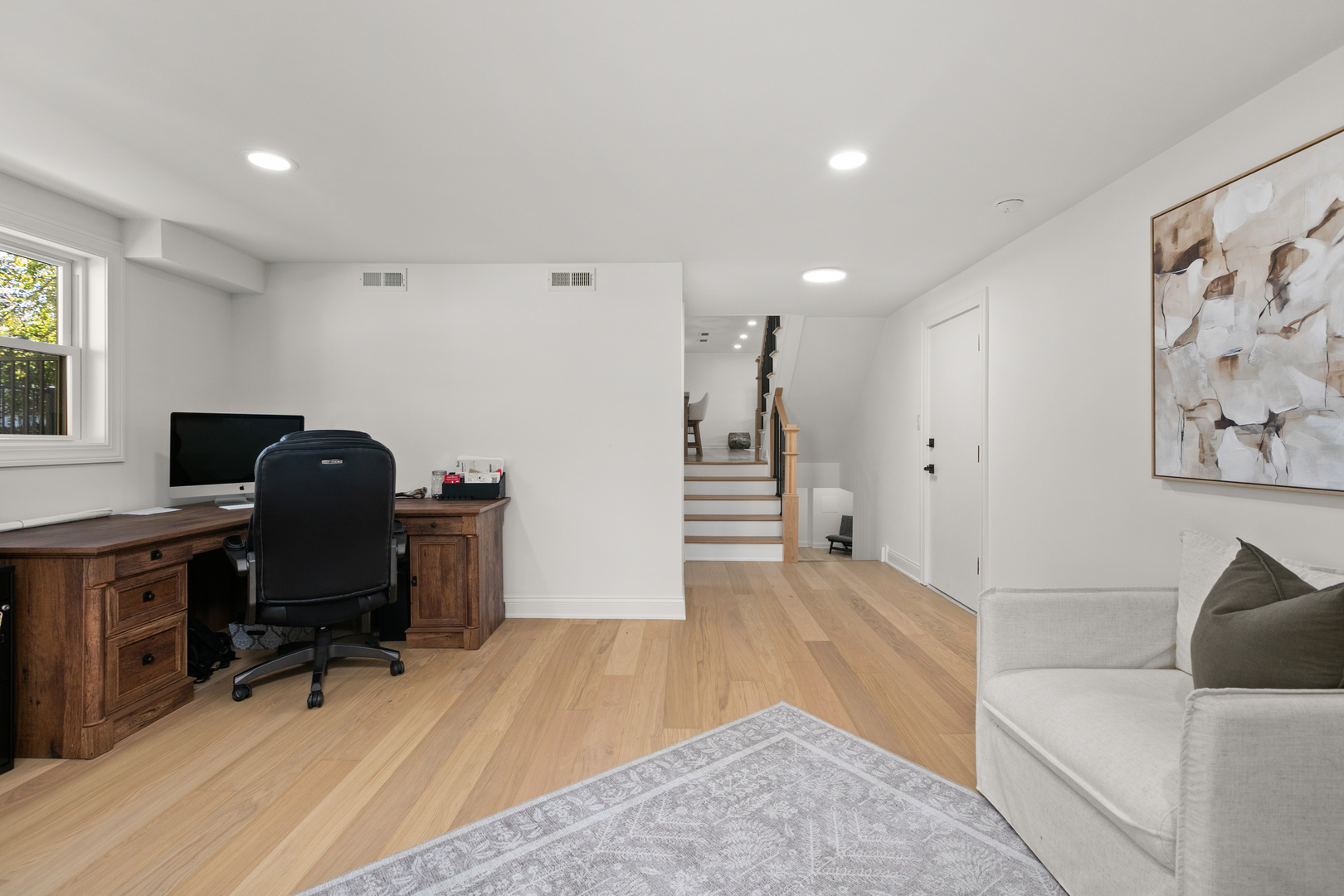 1349 Tinker Way Glenview, IL 60025 - Photo 30 of 42 a living room with furniture and a wooden floor