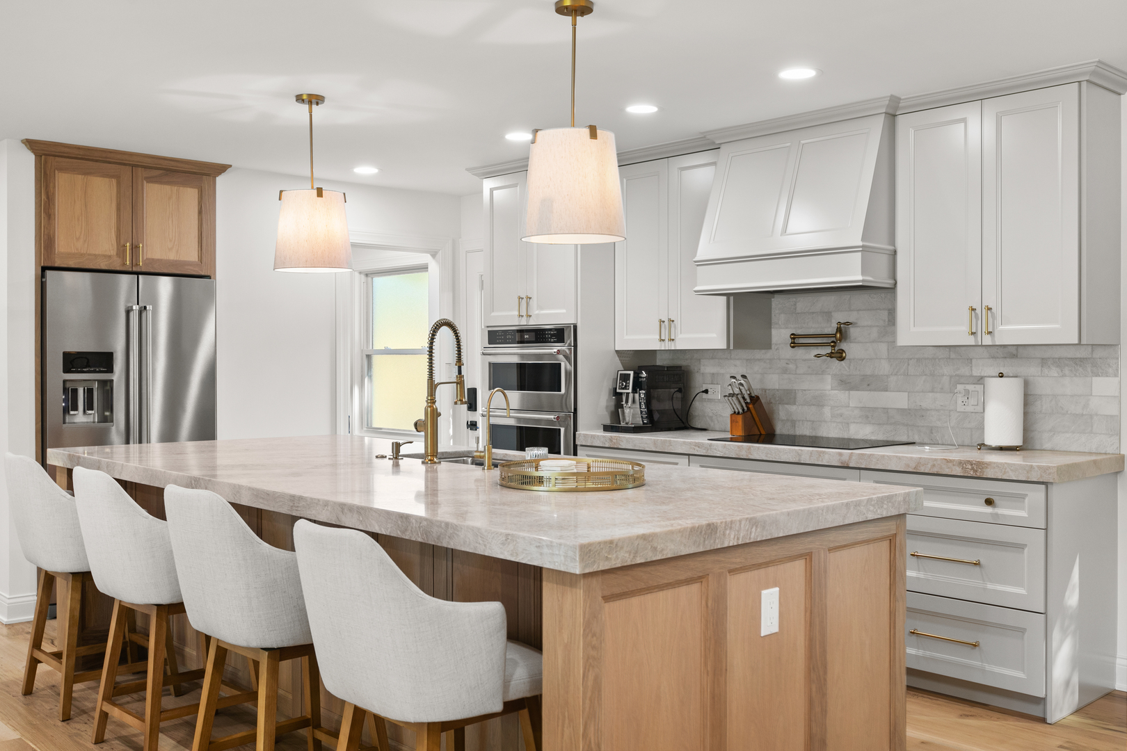 1349 Tinker Way Glenview, IL 60025 - Photo 9 of 42 a kitchen with stainless steel appliances granite countertop a stove a sink refrigerator and cabinets