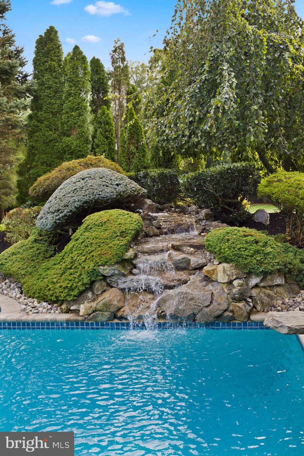 44 Walters Road Robbinsville, NJ 08691 - Photo 61 of 68 a view of a garden with a pathway