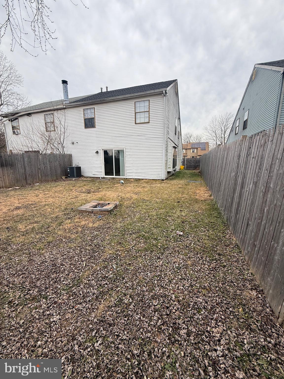 8 Hewitt Lane Sicklerville, NJ 08081 - Photo 15 of 15 a view of backyard of house and car parked