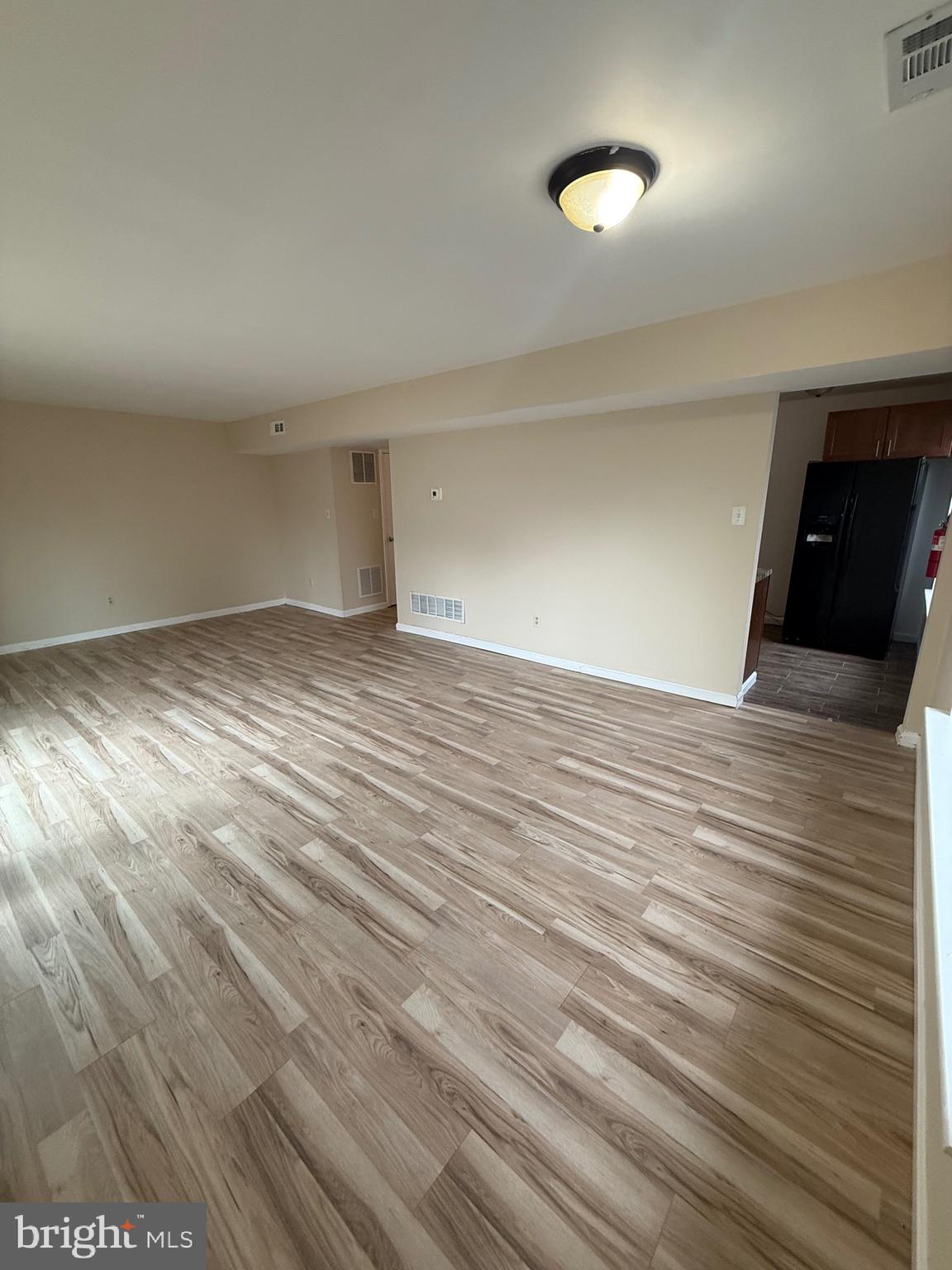 8 Hewitt Lane Sicklerville, NJ 08081 - Photo 6 of 15 a view of empty room with wooden floor