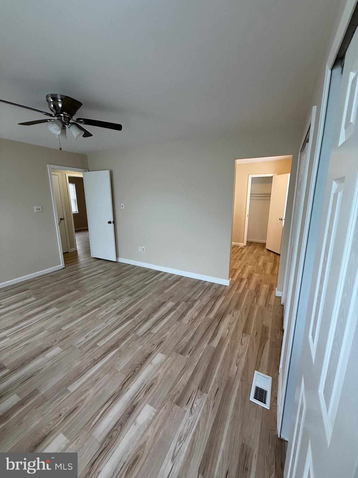 8 Hewitt Lane Sicklerville, NJ 08081 - Photo 10 of 15 a view of a room with wooden floor and staircase