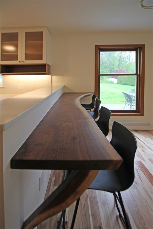 30-a & B Lee Road South Deerfield, MA 01373 - Photo 14 of 39 a balcony with table and chairs