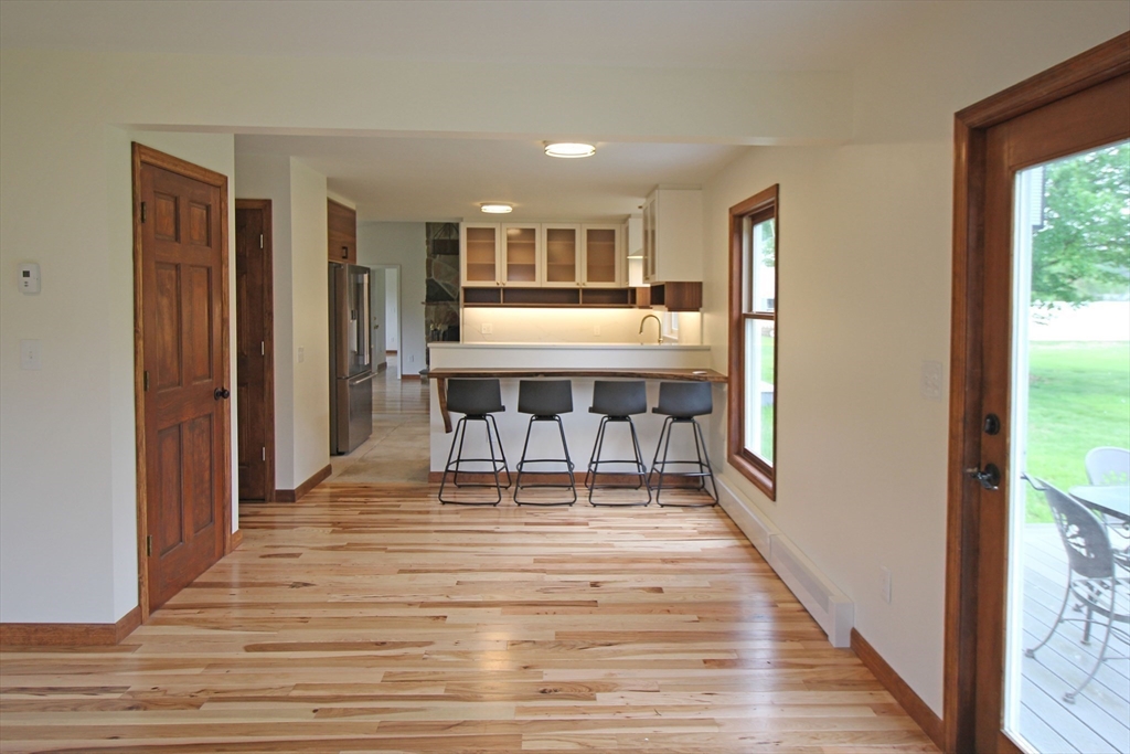 30-a & B Lee Road South Deerfield, MA 01373 - Photo 15 of 39 a view of a room with wooden floor and furniture