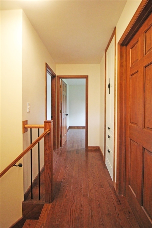 30-a & B Lee Road South Deerfield, MA 01373 - Photo 27 of 39 a view of a hallway with wooden floor