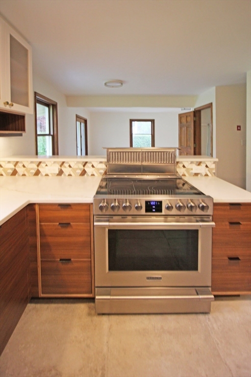 30-a & B Lee Road South Deerfield, MA 01373 - Photo 10 of 39 a stove top oven sitting inside of a kitchen