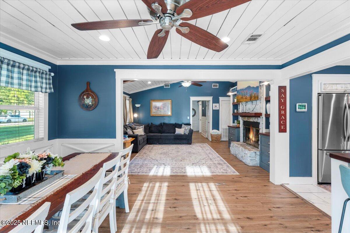 6582 Hamilton Crews Road Glen St. Mary, FL 32040 - Photo 12 of 44 a very nice looking room with a large window and chandelier