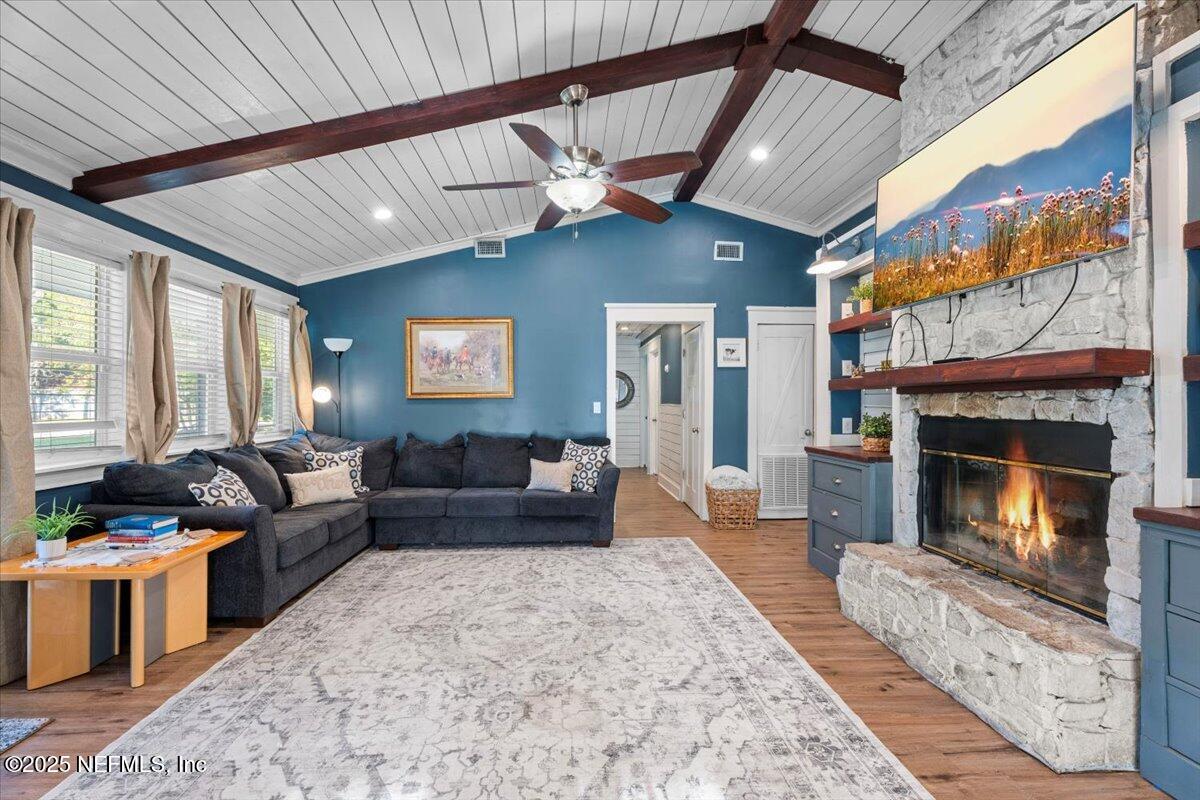 6582 Hamilton Crews Road Glen St. Mary, FL 32040 - Photo 6 of 44 a living room with furniture and a fireplace