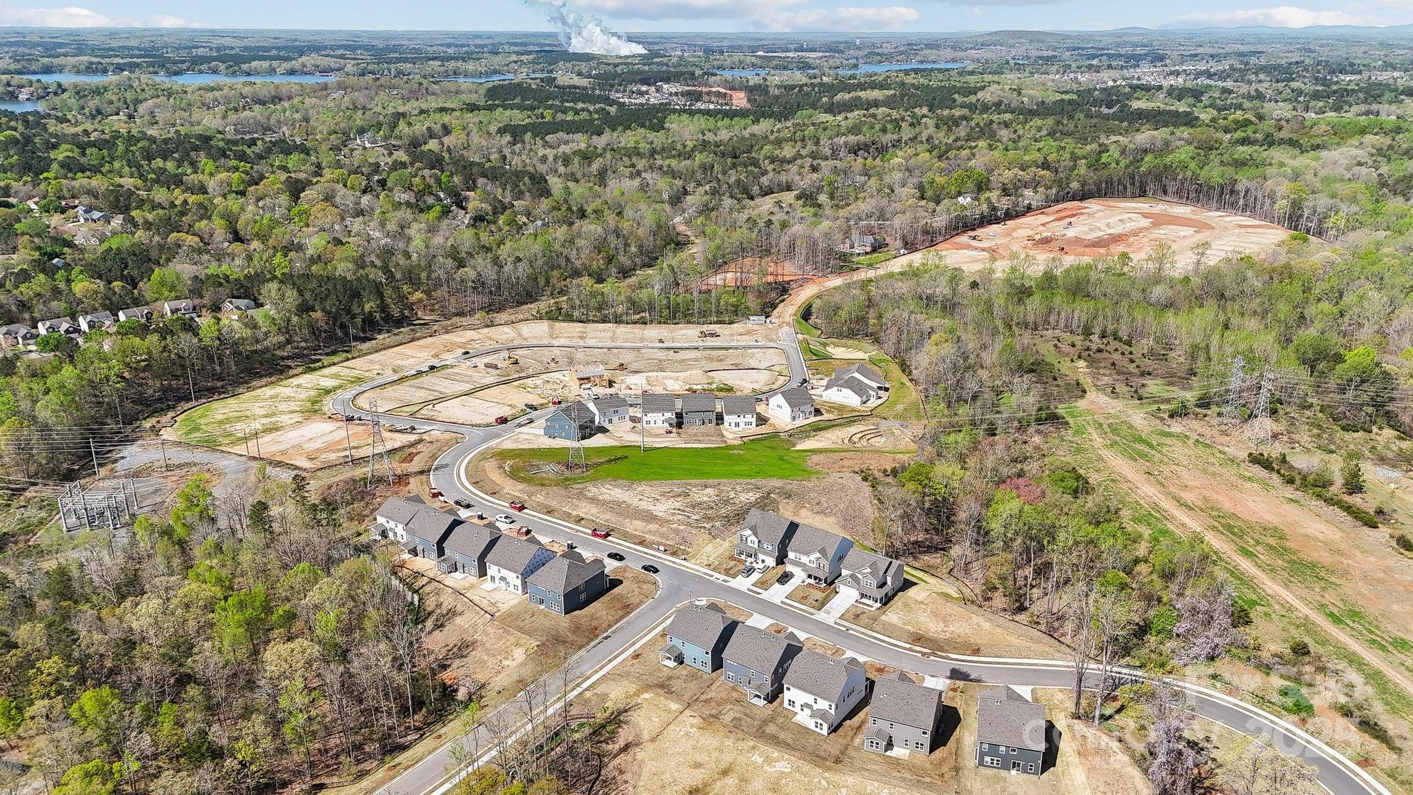 1465 Hubert Graham Way Tega Cay, SC 29708 - Photo 4 of 5 an aerial view of a house with a yard