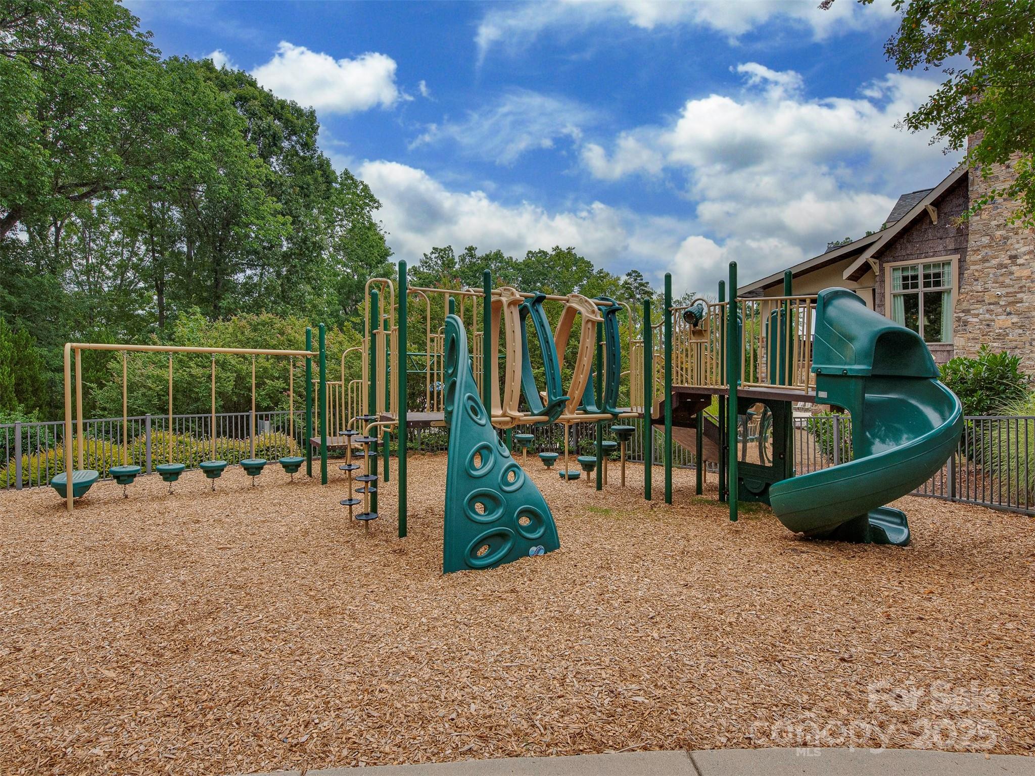 4 Pinnacle Way, Unit SAVANNAH York, SC 29745 - Photo 18 of 23 a view of a park with swings