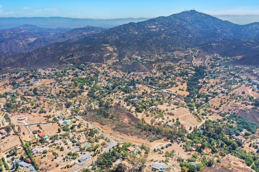 0 Vali Hai Road Poway, CA 92064 - Photo 21 of 46 a view of a dry yard with mountains in the background