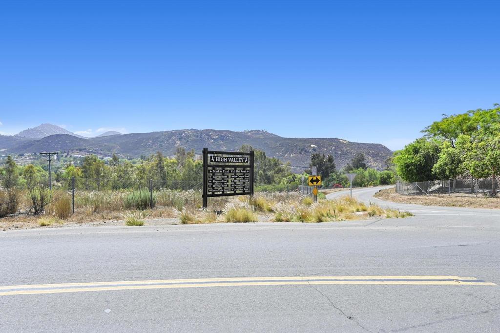 0 Vali Hai Road Poway, CA 92064 - Photo 32 of 46 a view of a house with a yard and mountain view