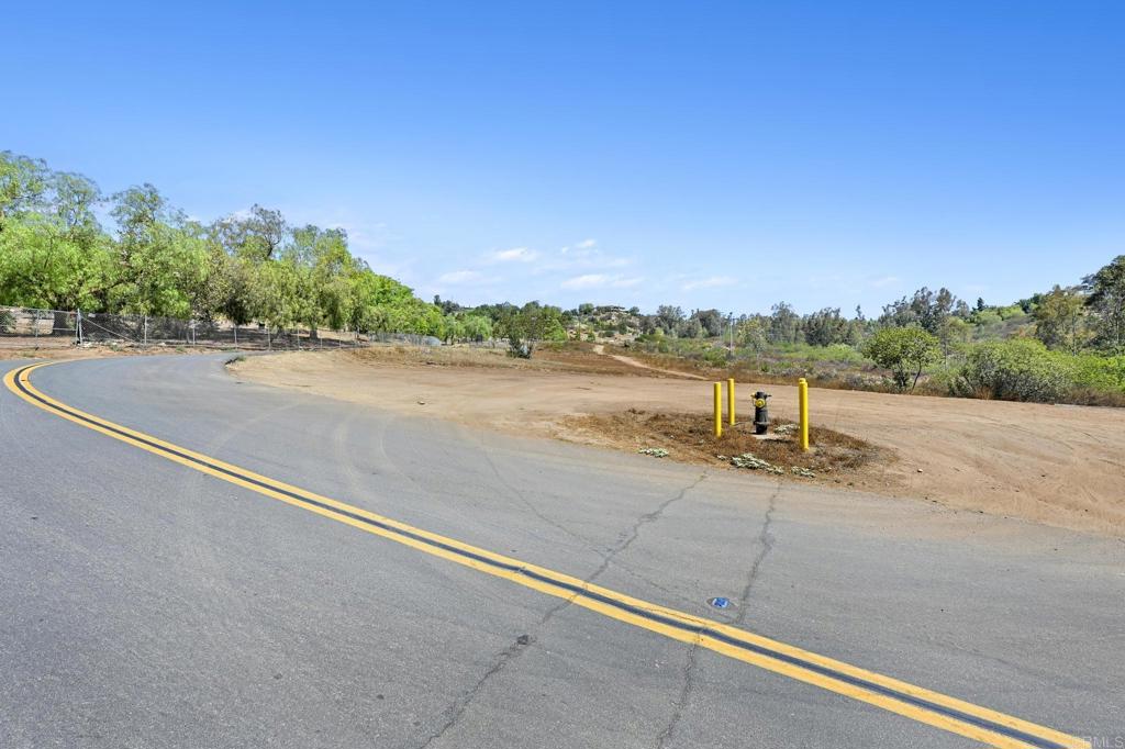 0 Vali Hai Road Poway, CA 92064 - Photo 36 of 46 a view of a street with a building in the background