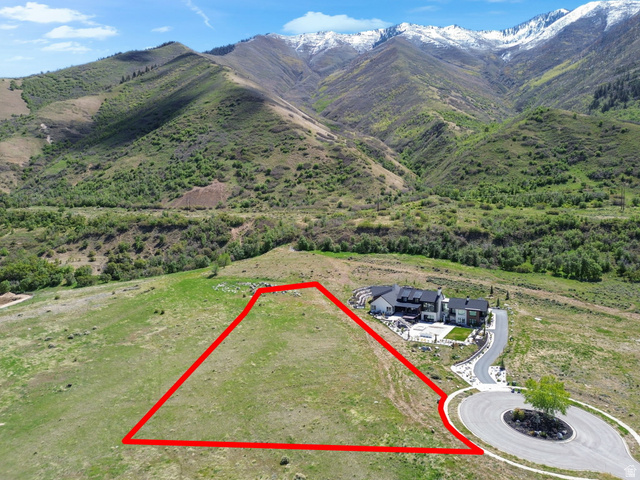 1284 Middle Canyon Court, Unit 69 Mapleton, UT 84664 - Photo 6 of 20 Aerial view of property and surrounding area with property boundaries highlighted and a mountainous background
