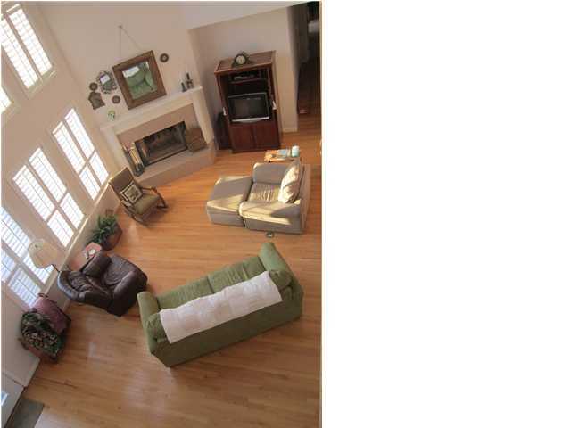 8244 Jordan Road Baker, FL 32531 - Photo 25 of 32 a living room with furniture and a flat screen tv