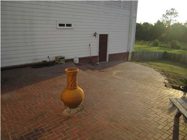 8244 Jordan Road Baker, FL 32531 - Photo 10 of 32 a front view of a house with backyard
